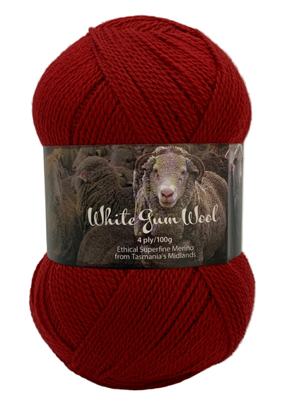 Deep cool Red "Hawthorn" coloured ball of superfine 4 ply Merino wool on white background