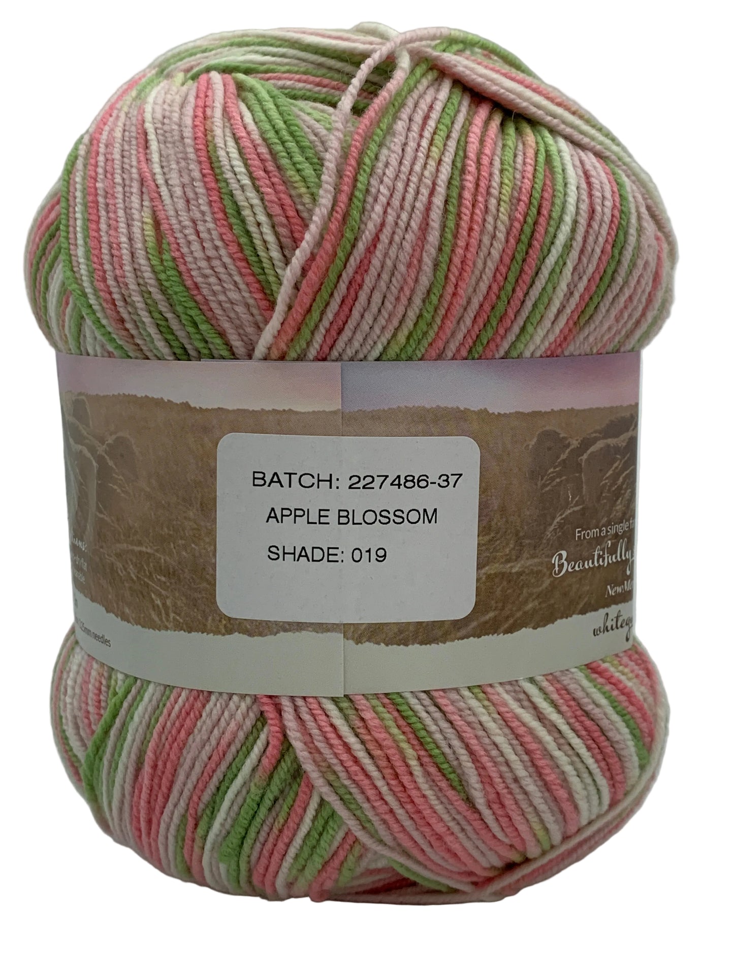 Spring multicoloured "Apple Blossom" ball of superfine 4 ply Merino wool on white background