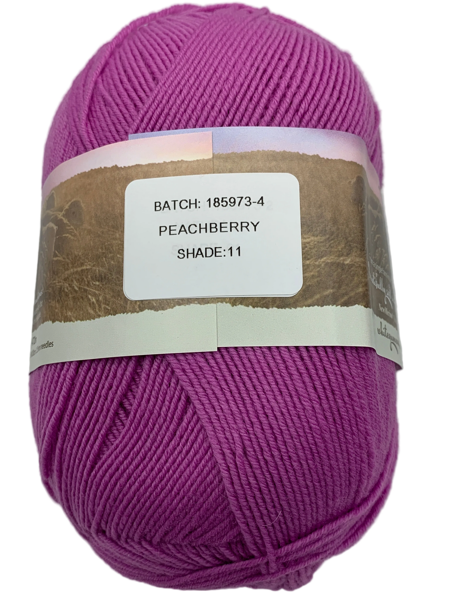 Mid-pink "Peachberry" coloured ball of superfine 4 ply Merino on white background