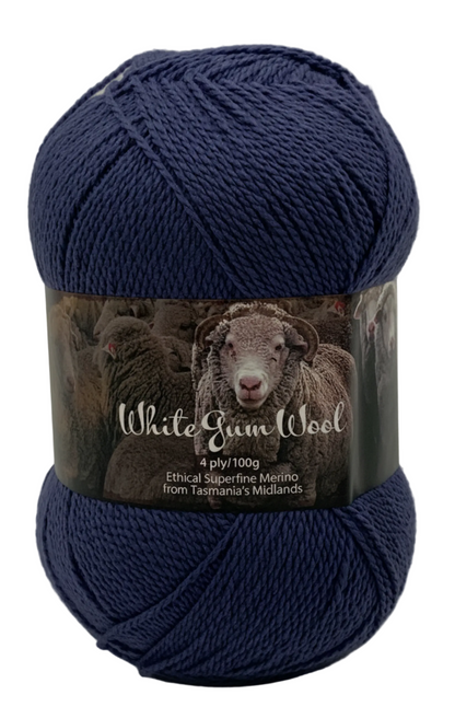 Dark grey blue "Storm" coloured ball of superfine 4 ply Merino on white background
