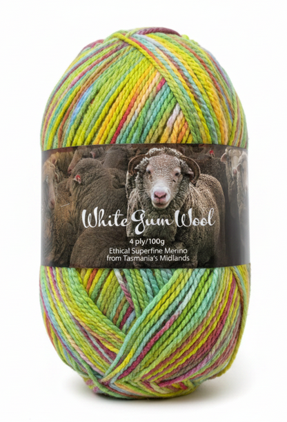 Multicolour "Wildflower"  ball of superfine 4 ply Merino wool on white background