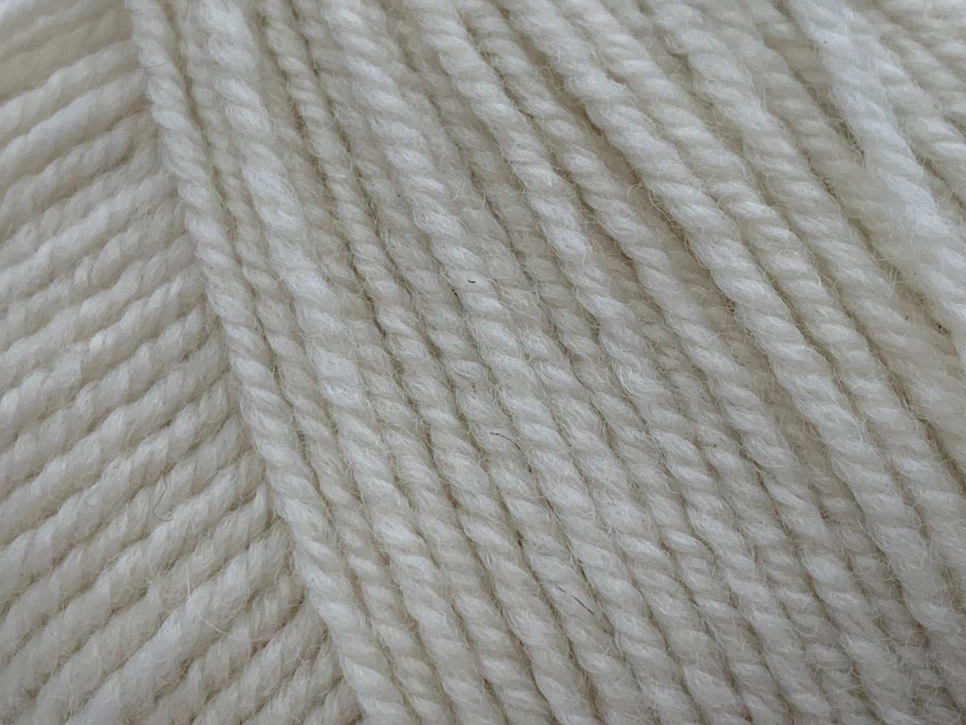 Natural coloured Superfine Merino wool closeup.
